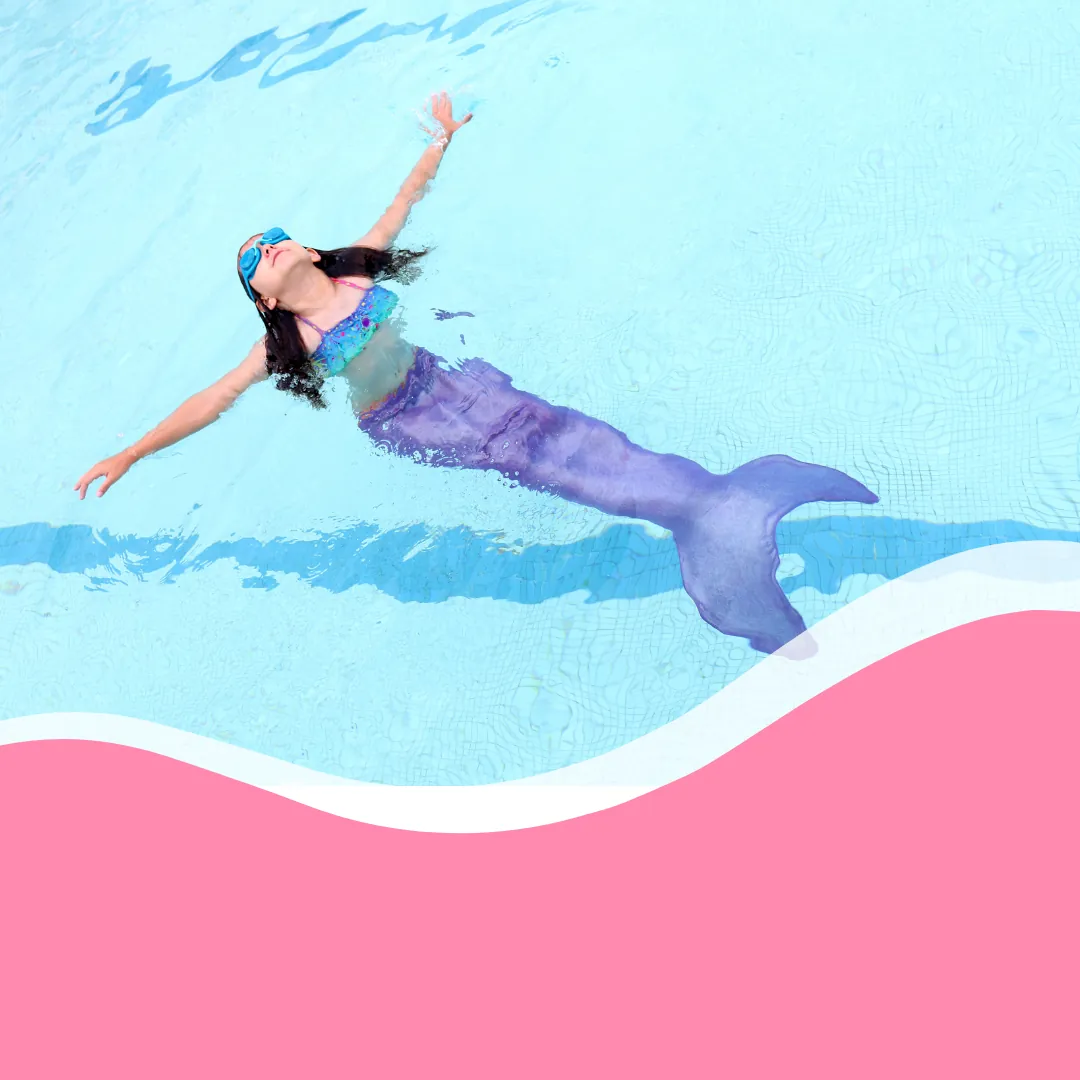 Swimmers having fun during a pool party